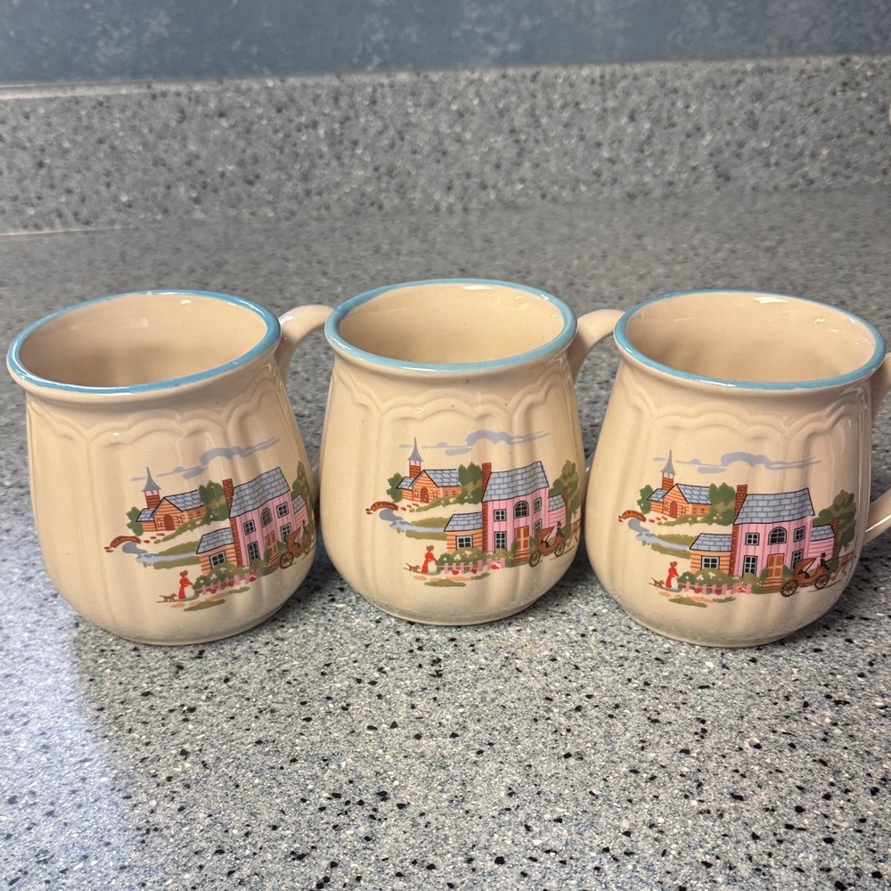 Whimsical Cream Ceramic Mugs with Village Design